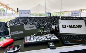 Live event production control station with video and audio equipment for an outdoor corporate event.